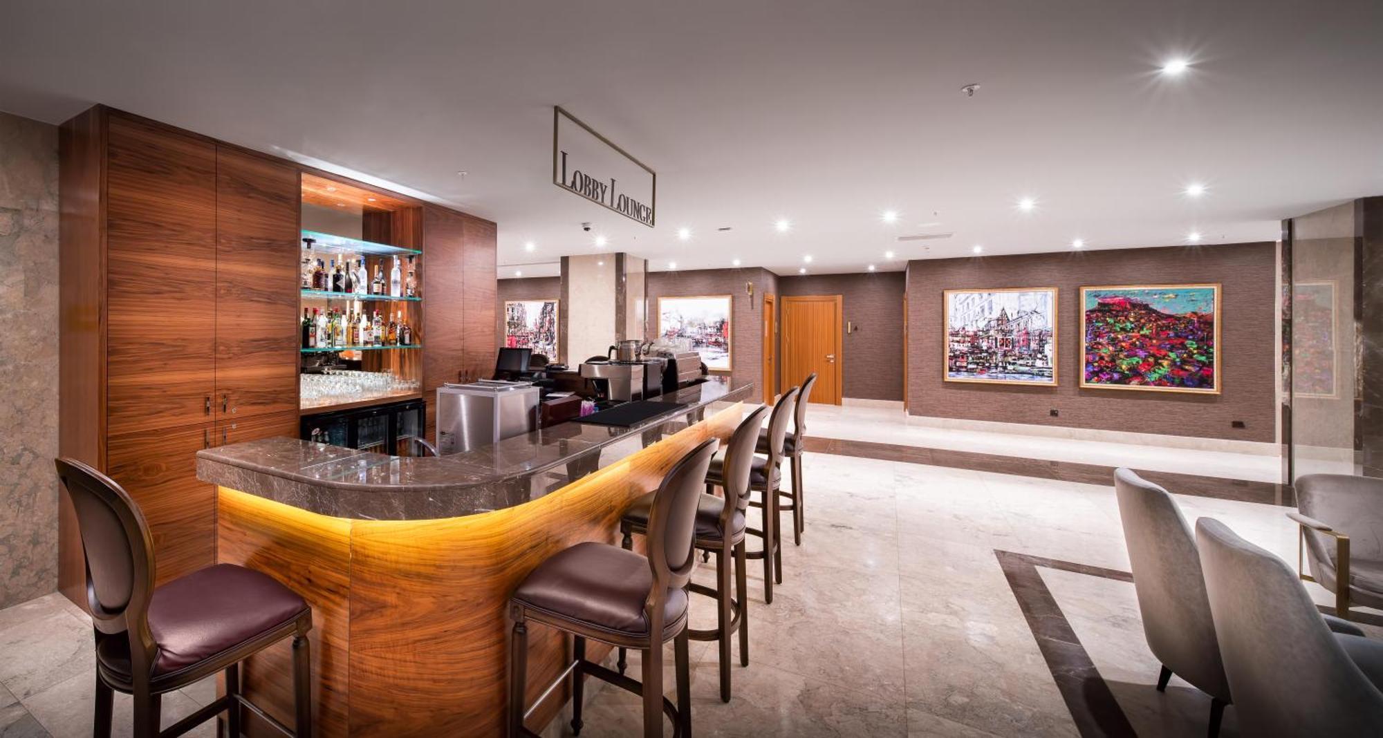 Concorde Tower Hotel & Casino Nikosia Bagian luar foto The bar at the London Marriott West End
